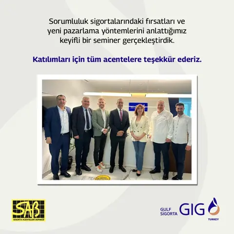 SAB ve Gulf Sigorta temsilcileri, ofiste yedi kişilik toplu fotoğrafta