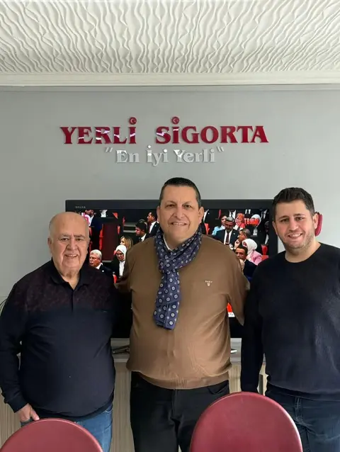 ESAD heyeti Egepol ofisinde masa başında dört kişi